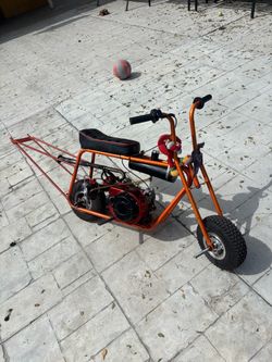 Mini bike wheelie bar trades