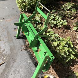 John Deere Thatcher attachment