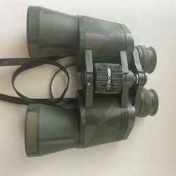 Tasco Zip 10x50mm model focus binoculars with Case, rarely used.