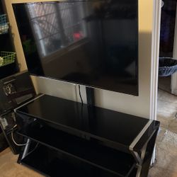 49” TCL Tv Like New And Tv Stand Very Good Condition