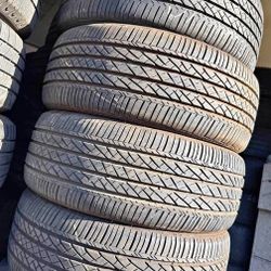 235-50R20 Bridgestone Tires, Perfecta Condición Set De 4)