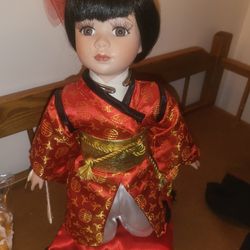 Kneeling Geisha Porcelain Doll