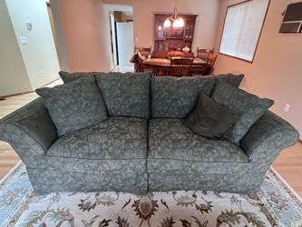 Green Floral Upholstered Sofa with Pillows