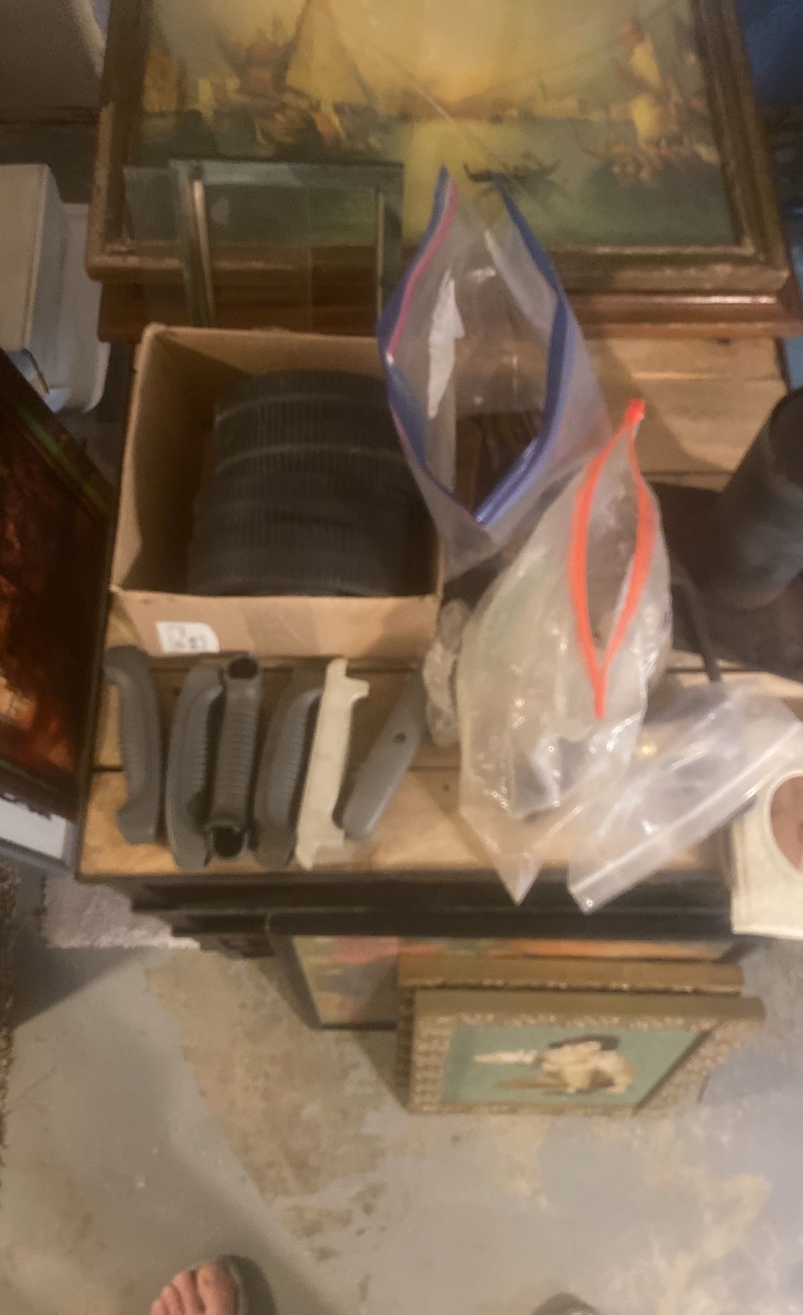 Weber Kettle handles Weber Kettle wheels, a bunch of Weber Kettle parts and smoker parts in bags and a chimney for a barrel smoker along with tith the