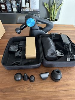 Theragun PRO, Stand Charger, 6 Attachments, 2 Batteries, Carry Case
