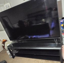 75' TV with tv stand included