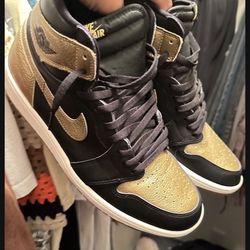 Gold Jordan 1s 