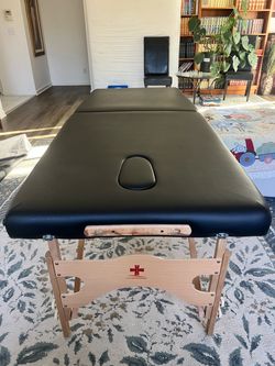 Massage table
