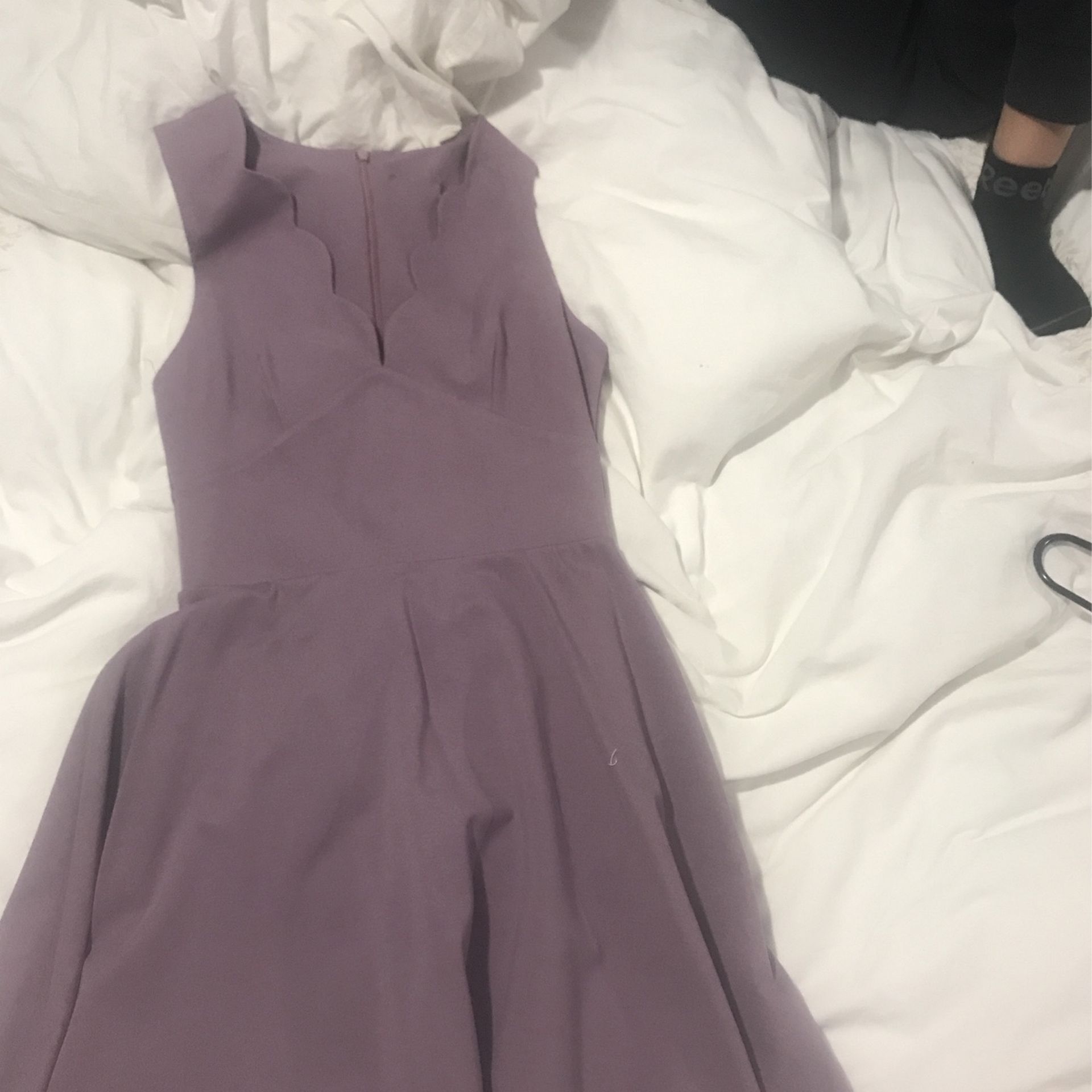 Purple as a prom dress never worn before size 2