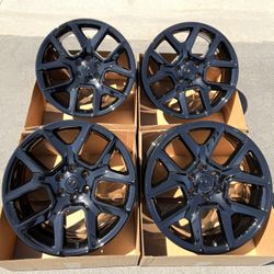 22” Ram Laramie original rims in new gloss black