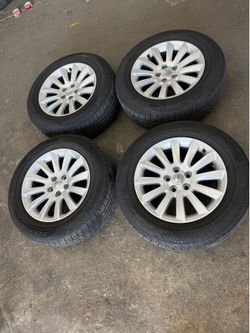 17 inch chrysler, charger, challenger wheels and tires 5x115 bolt pattern  Tires  225-65-17 mojave brand 90% thread   Asking 450$