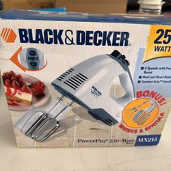 Brand New Black and Decker hand mixer with attachments