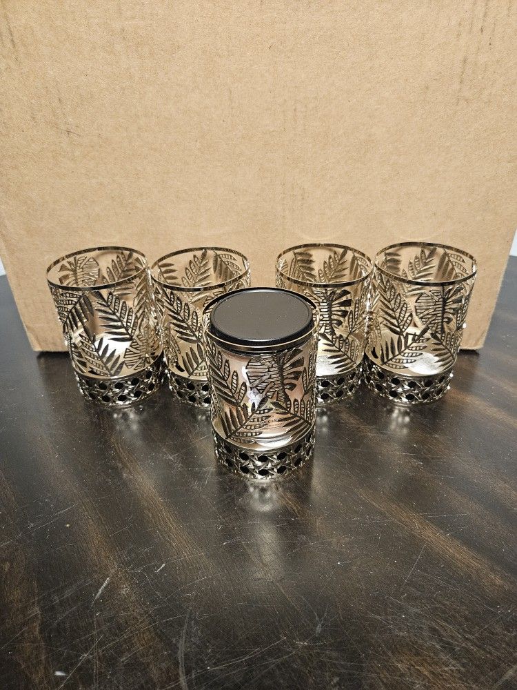 Single white candle holders.