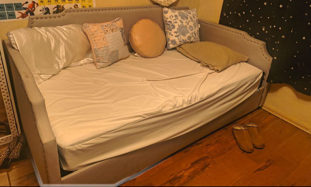 Sofa bed with bottom roll out bed