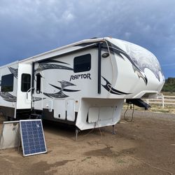 2013 Keystone Raptor 45’ Fifth Wheel Toy Hauler