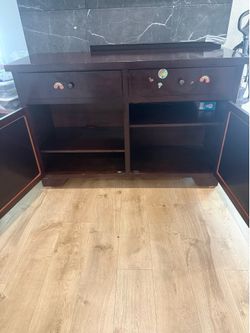 Tv  furniture free. Pick it up Poway