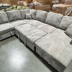 NEW! LARGE Sectional Sofa With Pull Out Bed And Lots Of Storage