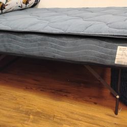 Twin mattress and foldable frame