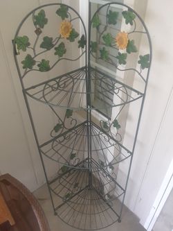 Iron plant holder