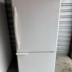 White Whirlpool Refrigerator And Freezer