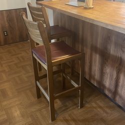 Oak and leather bar height chairs