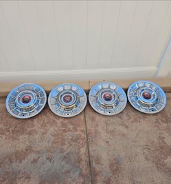 1957 cadillac hubcaps