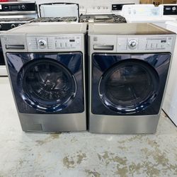 Kenmore electric washer and dryer—includes a receipt for a 90-day warranty.