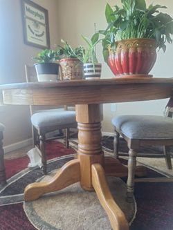 Solid oak table with 4 chairs