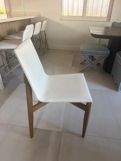 Wooden leather chairs