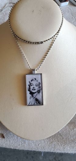 Marilyn  Monroe/Audrey Hepburn  pendant necklaces  price is each!