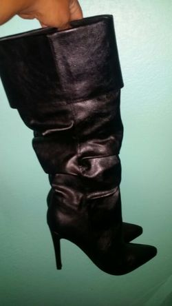 Black knee high boots...wide calf opening. ..great condition!