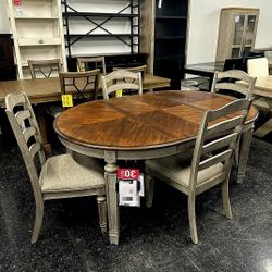 LODENBAY ANTIQUE GRAY EXTENDABLE ROUND/OVAL DINING SET