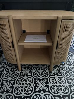 Caned console with shelves