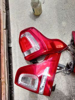 2011-2015 Ford Explorer tail lights with all the accessories OEM.