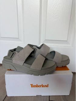 Timberland Greyfield 2-Strap sandals in a taupe suede color.