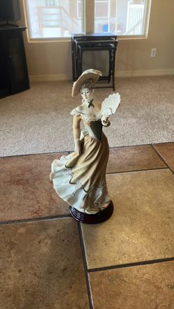 Armani porcelain doll