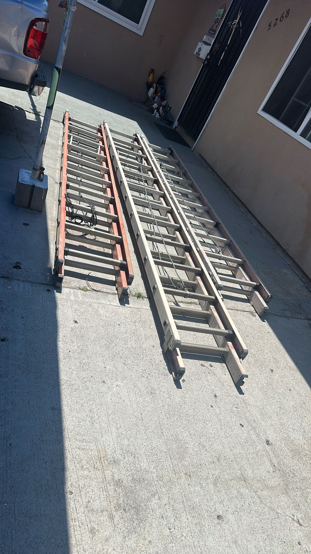 3 Ladders, 2 20 Ft, 1 24 Ft