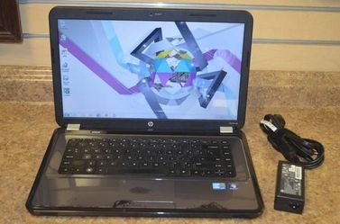 14"hp laptop-dualcore@2.2ghz,4gigs,320hd,webcam,hdmi,dvdrw,wifi -  (Win7 pro and office incl))