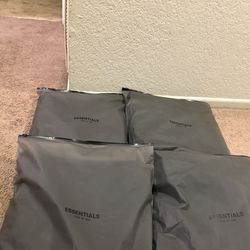 Black on black essentials hoodies