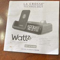 Phone And Watch Chargers In An Alarm Clock With A Time Projecting To The Ceiling It Is Made By The Lacrosse Technology Company