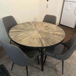Wood Dining Table with 4 Gray Upholstered Chairs
