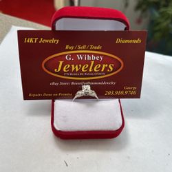 14 Kt white gold & diamond ring