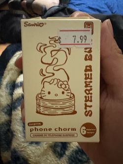 Hello kitty phone charm (cinnamon roll)