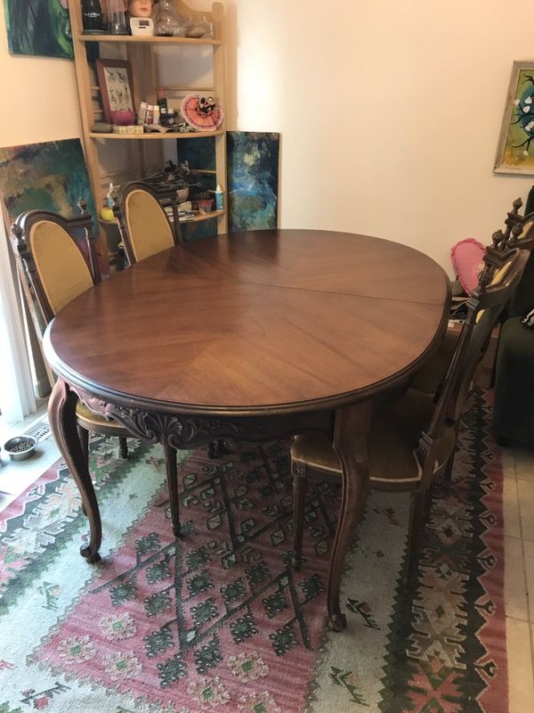 Antique dining table and chairs set today only