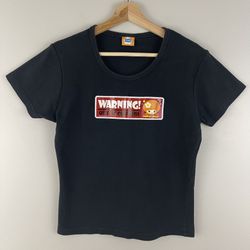 COSMIC DEBRIS Oopsy Daisy Vintage Y2K 2000’s Black Warning! Out Of Control Tee