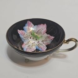 Unmarked footed cup made in Japan Hand Painted black&pink flowers With Gilting 