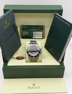 2009 Rolex SeaDweller 44mm 116660 men’s watch stainless steel black dial oyster bracelet ceramic bezel card tag booklet.