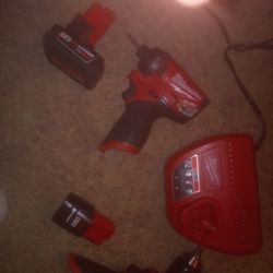 Milwaukee Fuel Hammer Drill And Impact Driver (2 batteries+C.Dock)