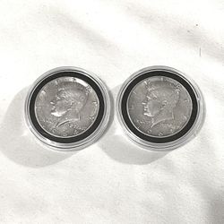 Uncirculated Sealed In Capsule 1964 Silver Kennedy Half Dollars. With Some Toning 