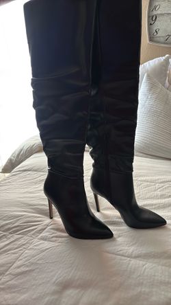Black leather knee high boots